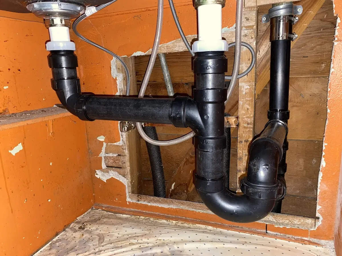 Professional Garbage Disposal Repair equipment and tools on the job in Winfield